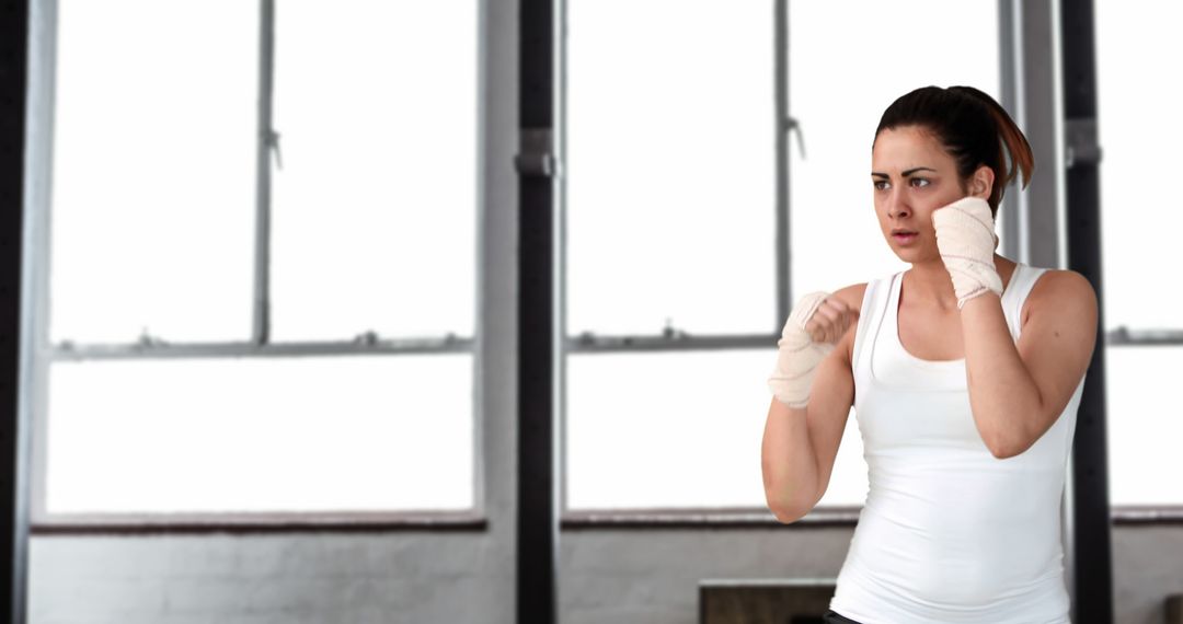 Female Boxer Practicing Shadow Boxing in Gym - Free Images, Stock Photos and Pictures on Pikwizard.com