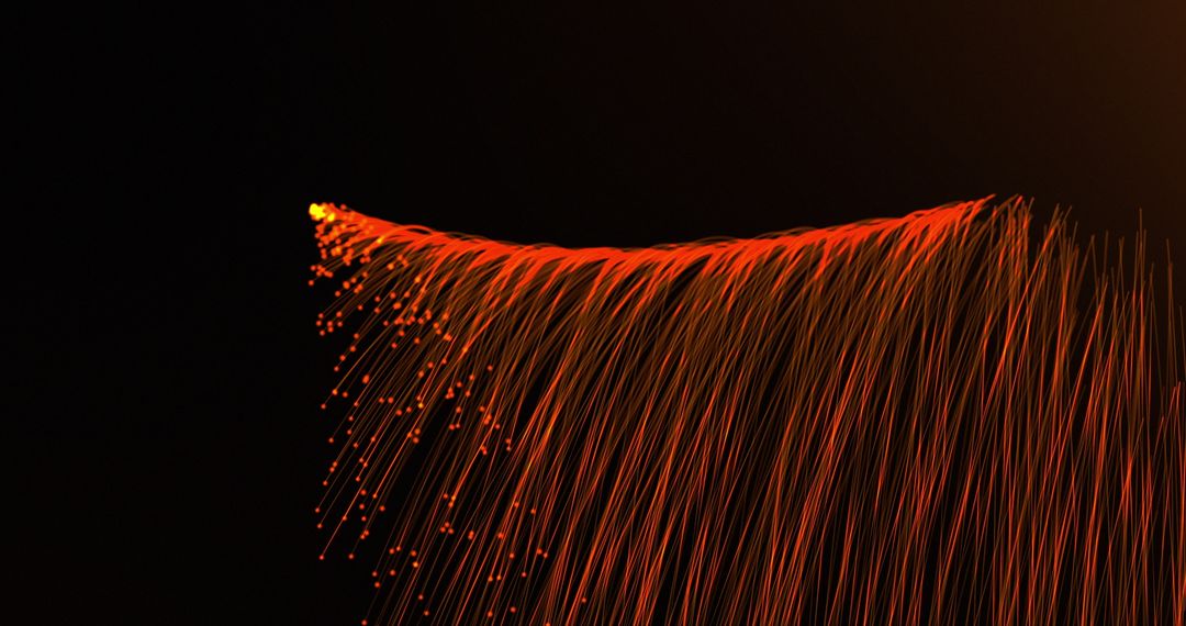 Dynamic Orange Light Trails Elegantly Flow Against Night
