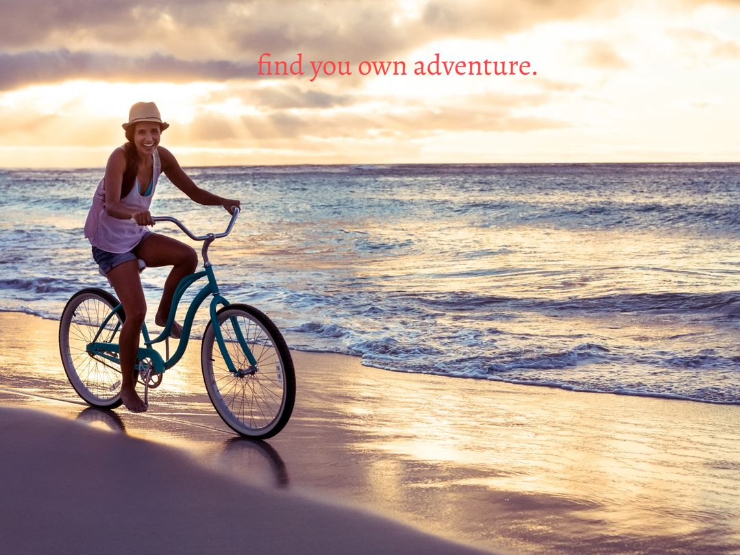 Woman Riding Bicycle at Sunset on Tranquil Beach