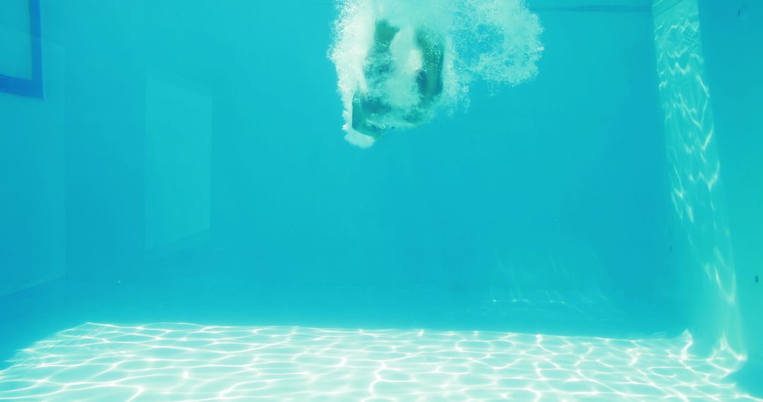 Abstract Underwater View of Diver Making Splash - Free Images, Stock Photos and Pictures on Pikwizard.com