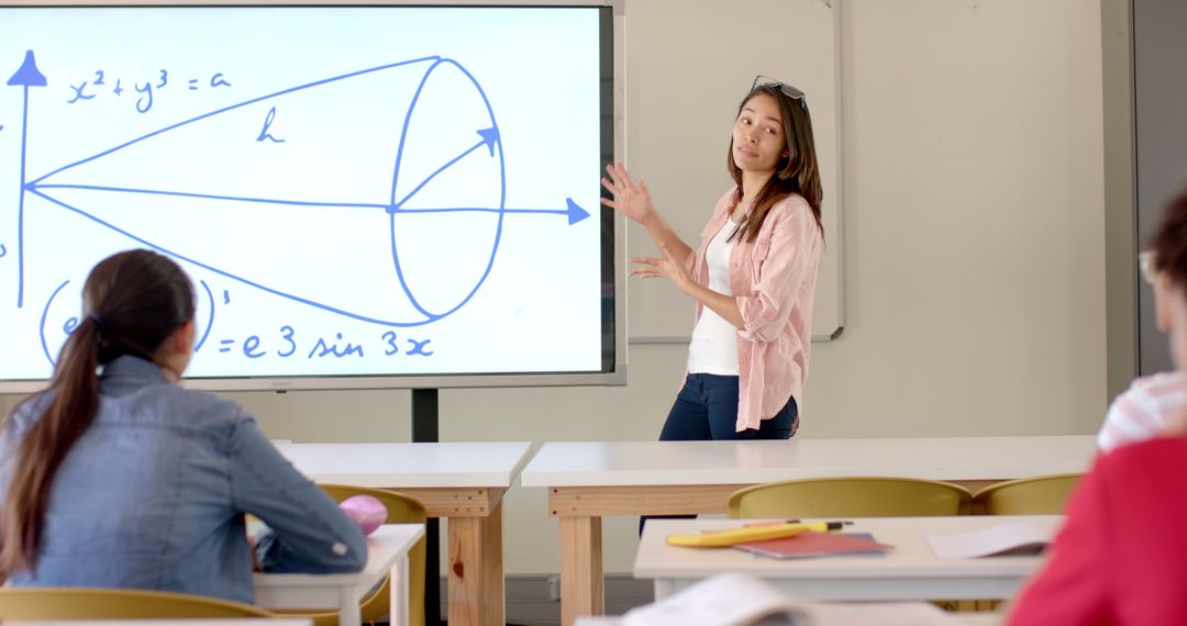 Teenager Explaining Geometric Concepts in Classroom Setting