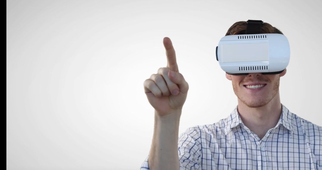 Happy Man Exploring Virtual Reality with VR Headset