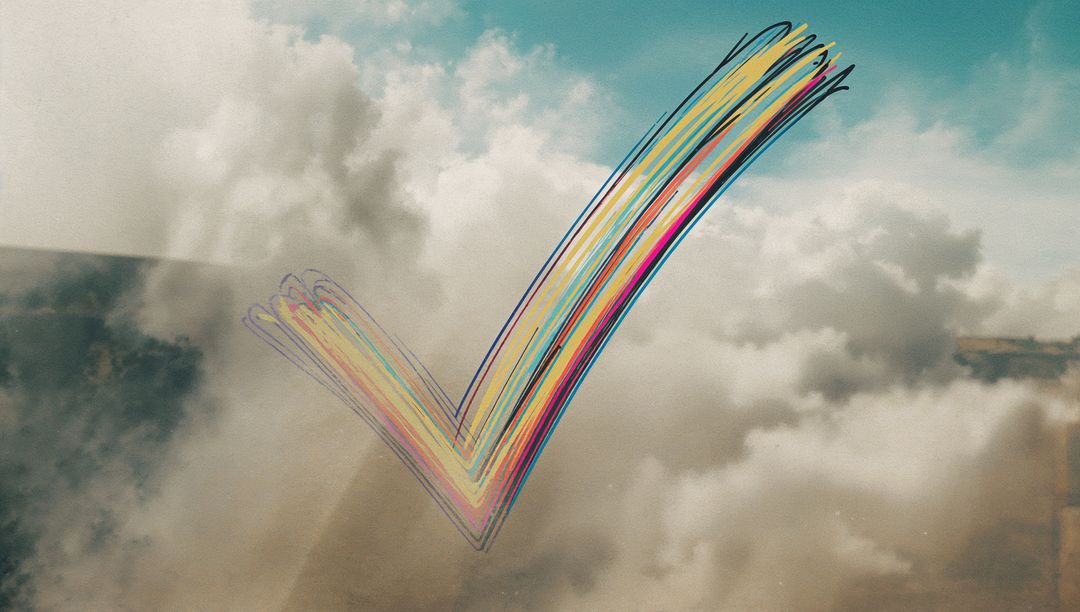 Vibrant Multicolor Check Mark Above Clouds with Bright Strokes