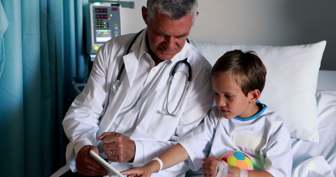 Caring Doctor Comforting Young Patient in Hospital Room - Free Images, Stock Photos and Pictures on Pikwizard.com