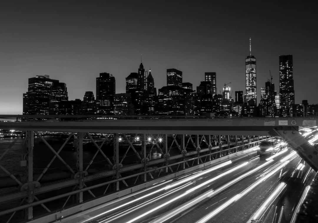 Grey Scale and Time Lapse Photography of a Bridge With Car during Night Time - Free Images, Stock Photos and Pictures on Pikwizard.com
