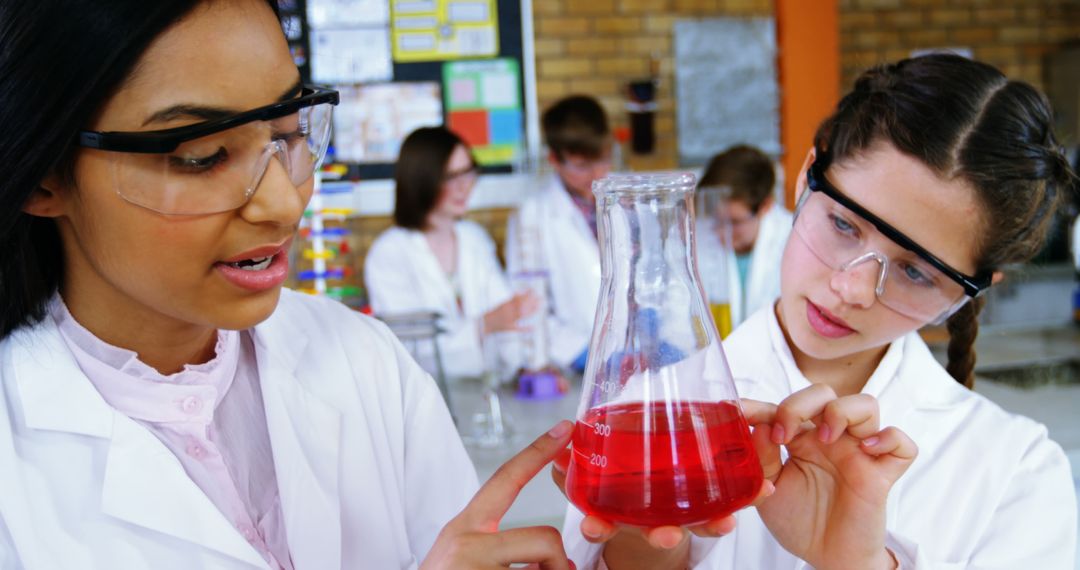 Girls Experimenting with Chemistry in Science Laboratory - Free Images, Stock Photos and Pictures on Pikwizard.com