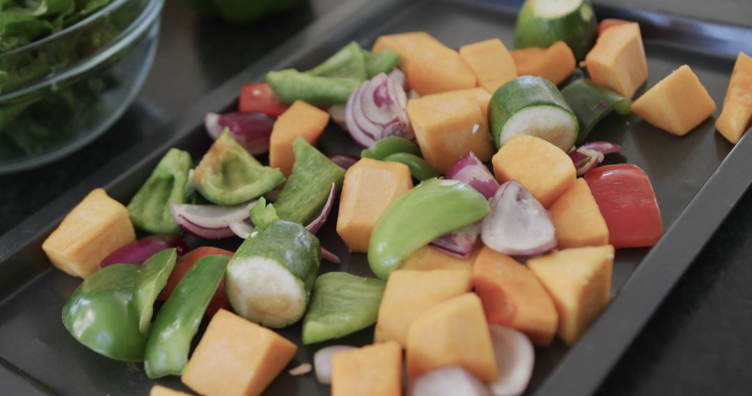 Freshly Cut Vegetables on Tray Ready for Roasting - Free Images, Stock Photos and Pictures on Pikwizard.com