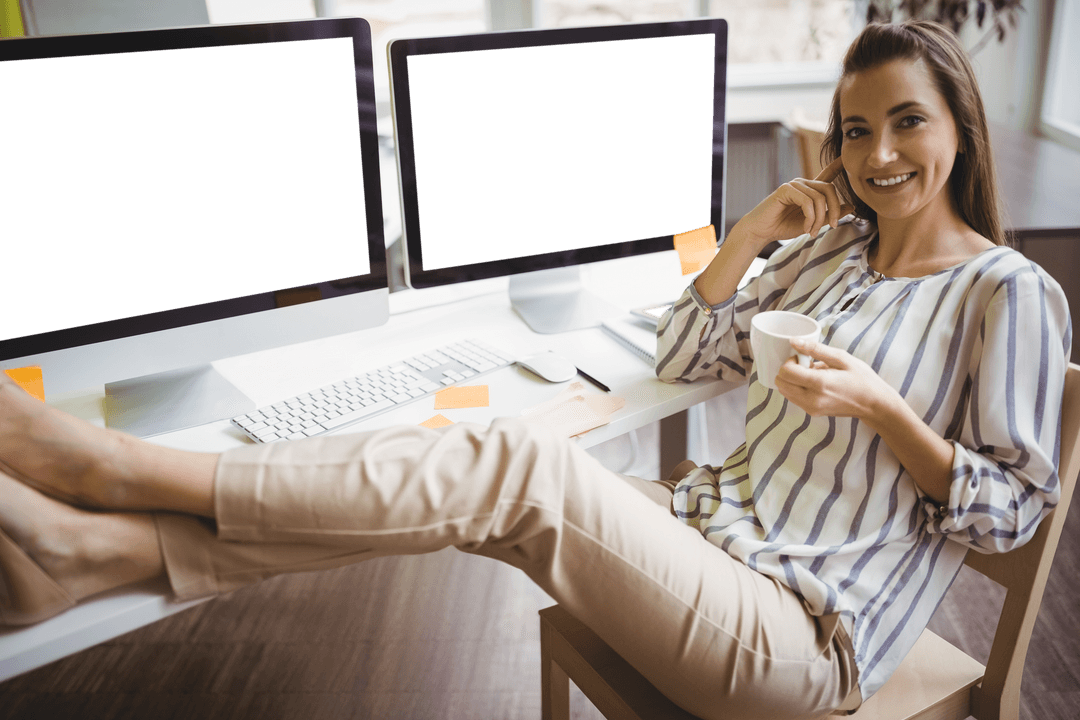 Confident Woman Relaxing at Work Desk with Transparent Screens