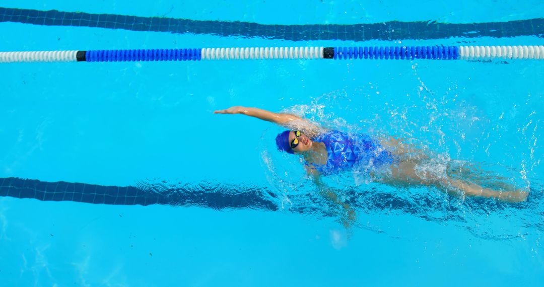 Female Athlete Practicing Backstroke in Pool - Free Images, Stock Photos and Pictures on Pikwizard.com