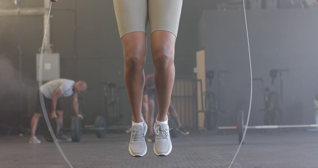 Close-Up of Woman Jumping Rope in Gym - Free Images, Stock Photos and Pictures on Pikwizard.com