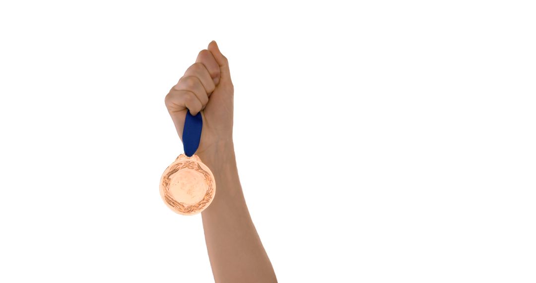 Hand holding gold medal on blue ribbon - Free Images, Stock Photos and Pictures on Pikwizard.com