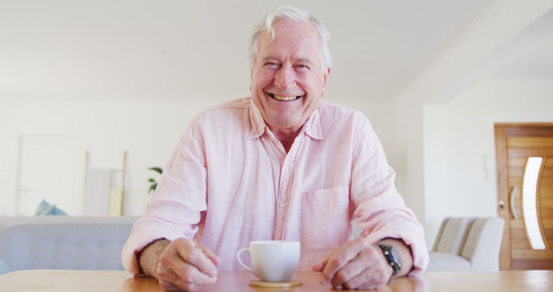 Smiling Senior Man Drinking Coffee at Home - Free Images, Stock Photos and Pictures on Pikwizard.com