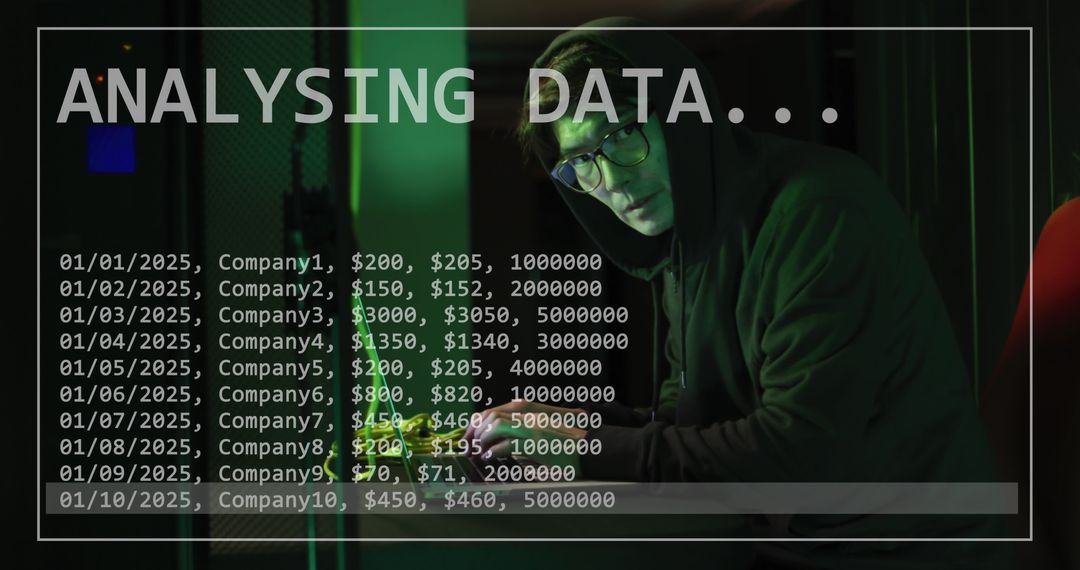 Asian Hacker Analyzing Data on Computer at Night