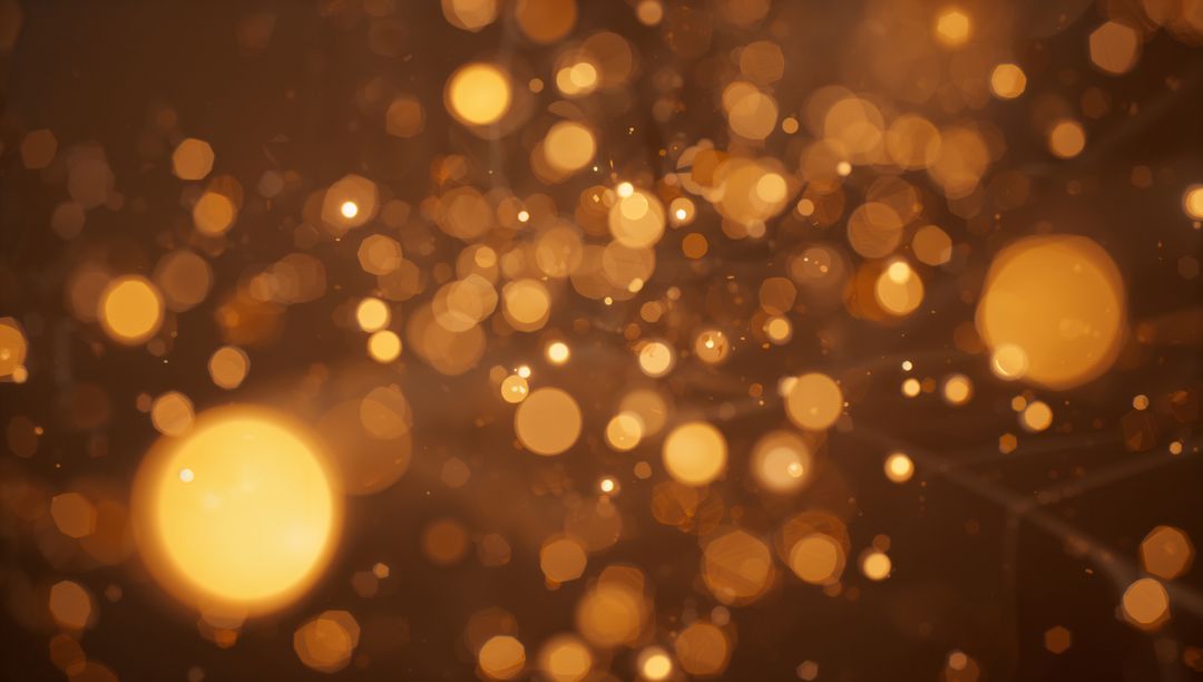 Glowing Gold Bokeh and Sparkling Orbs Over Amber Backdrop, Warm Abstract Light Texture
