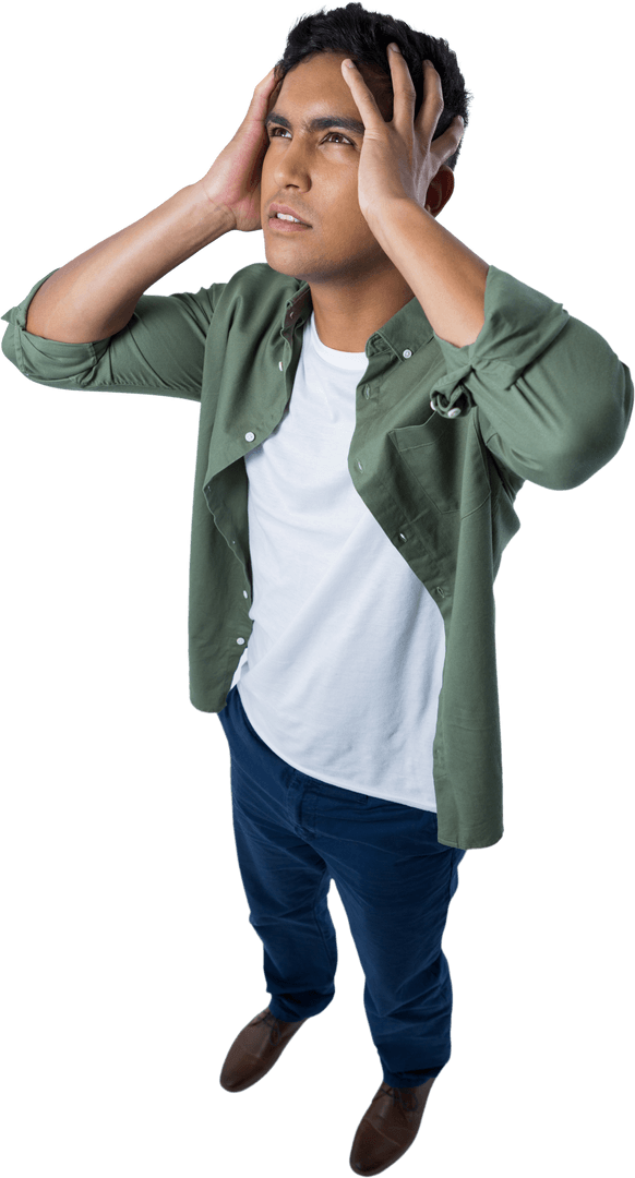 Tensed Man in Green Shirt Holding Head in Worry on Transparent Background