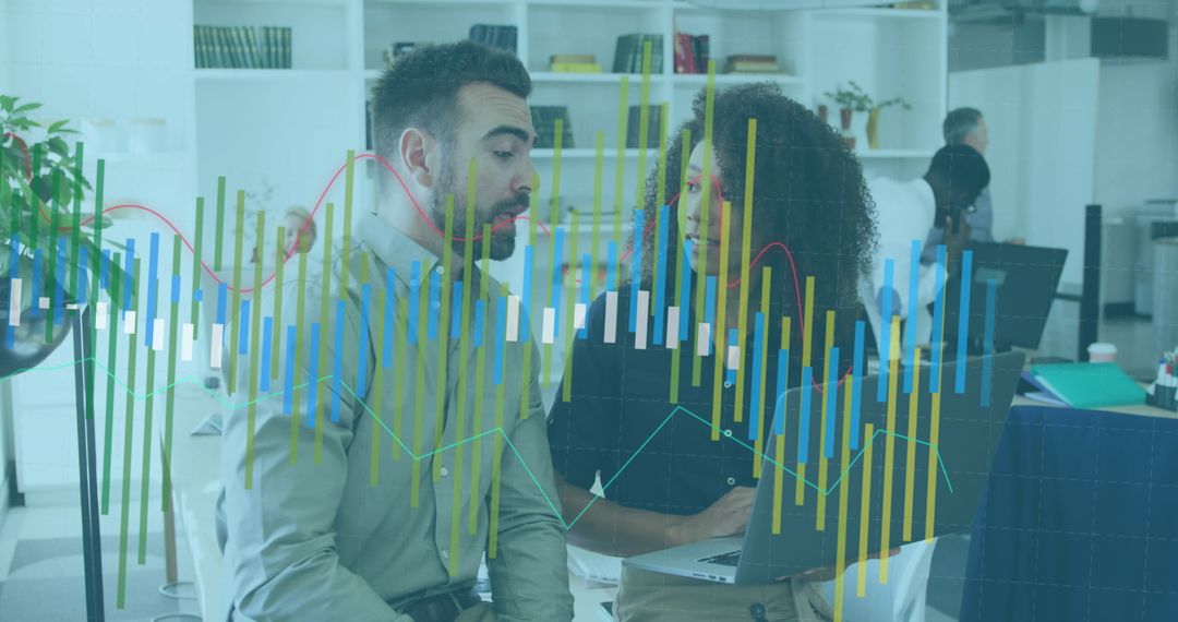 Diverse Professionals Analyzing Financial Reports with Digital Graphics