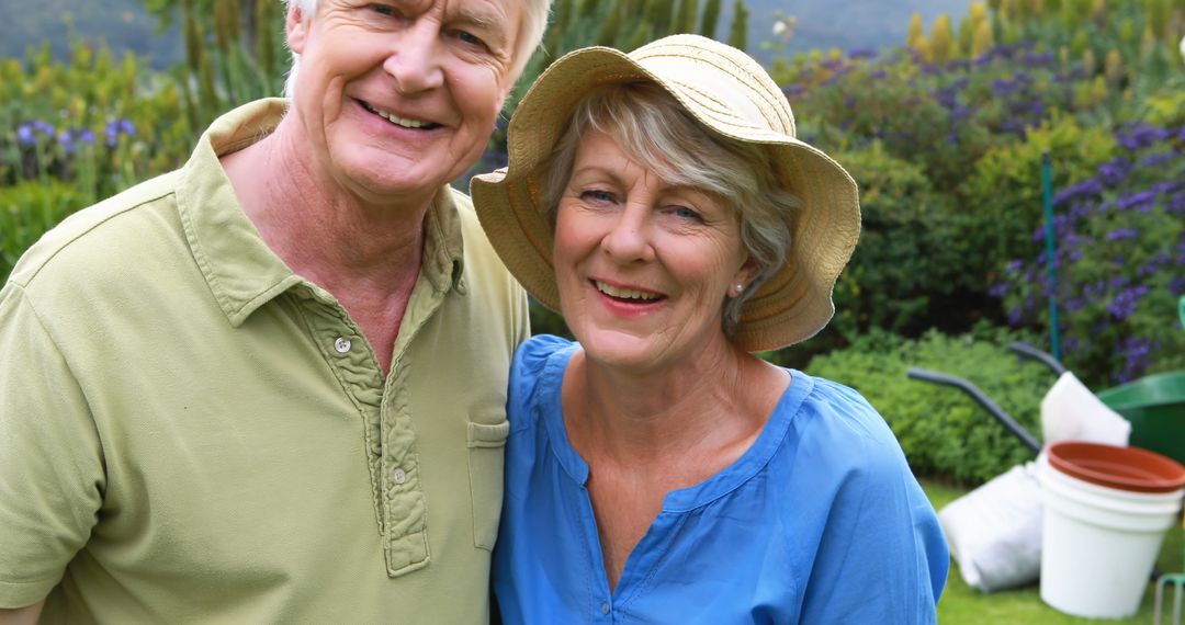 Smiling Elderly Couple Enjoying Time in Garden - Free Images, Stock Photos and Pictures on Pikwizard.com