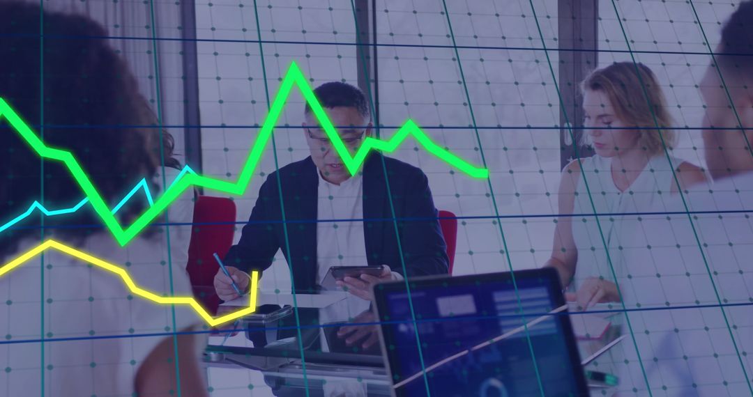Business Professionals Analyzing Financial Data with Charts Overlay