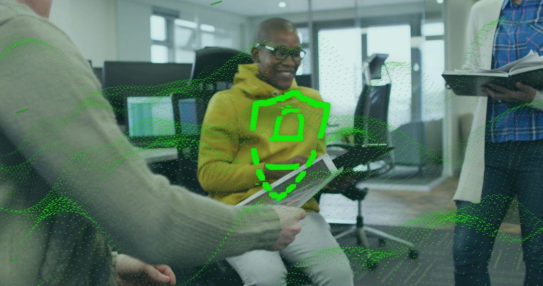 Team Reviewing Documents with Cyber Security Visualization in Office