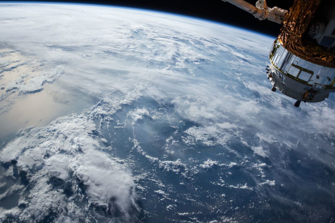 Breathtaking View of Earth from Space with Satellite in Foreground - Free Images, Stock Photos and Pictures on Pikwizard.com