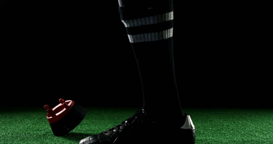 Close-Up of Soccer Player's Foot in Cleats and Socks on Field - Free Images, Stock Photos and Pictures on Pikwizard.com