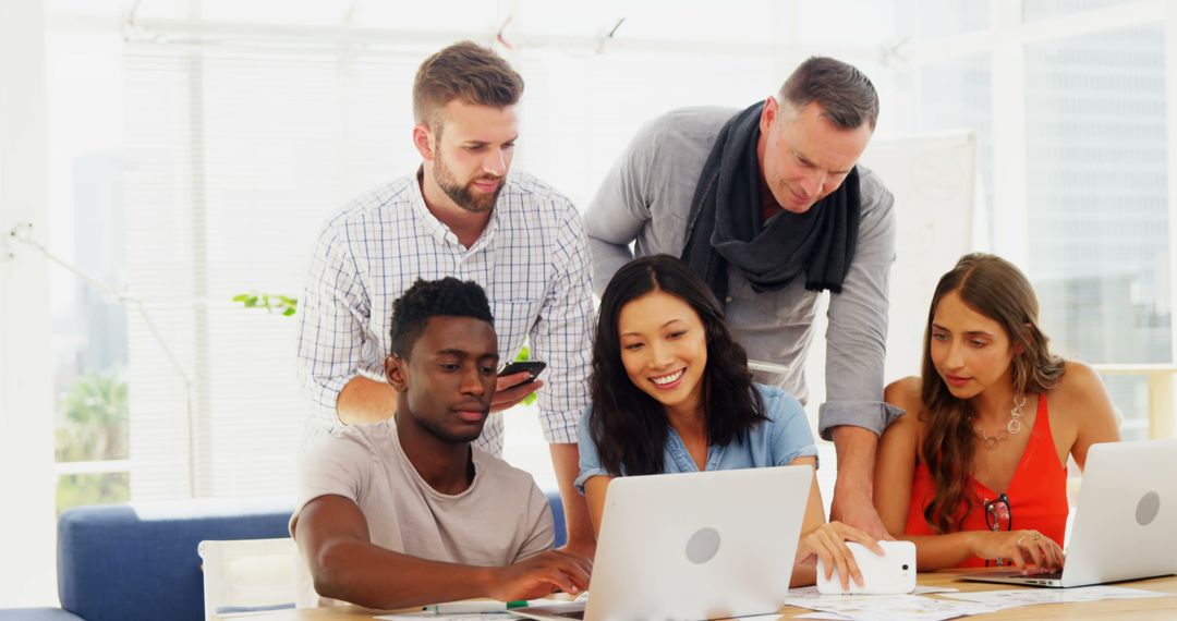 Diverse Collaborative Team in Modern Office Environment