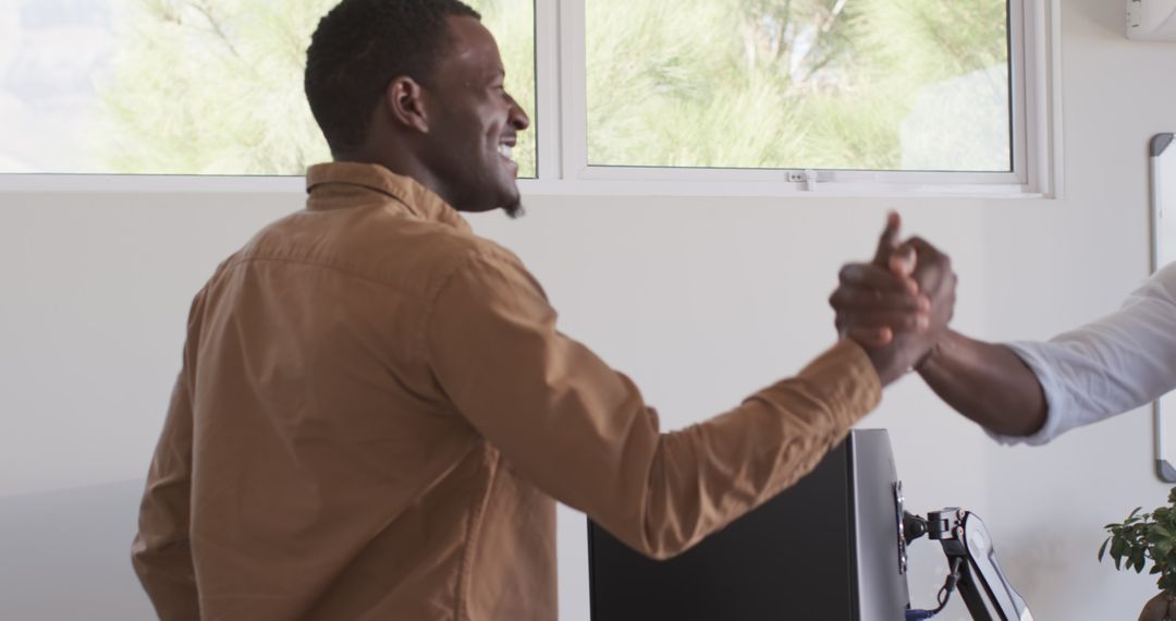 Business Team Collaboration with Handshake in Office Meeting