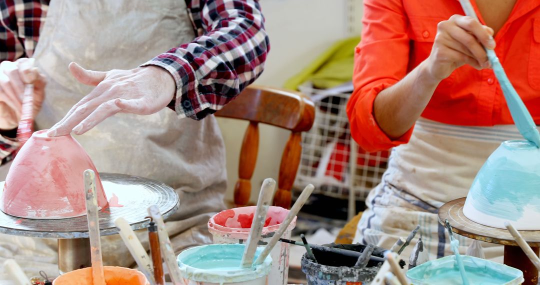 Close-up Of People Painting Ceramic Bowls In Pottery Workshop - Free Images, Stock Photos and Pictures on Pikwizard.com