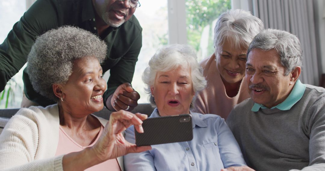 Happy Elderly Friends Taking a Selfie Together - Free Images, Stock Photos and Pictures on Pikwizard.com