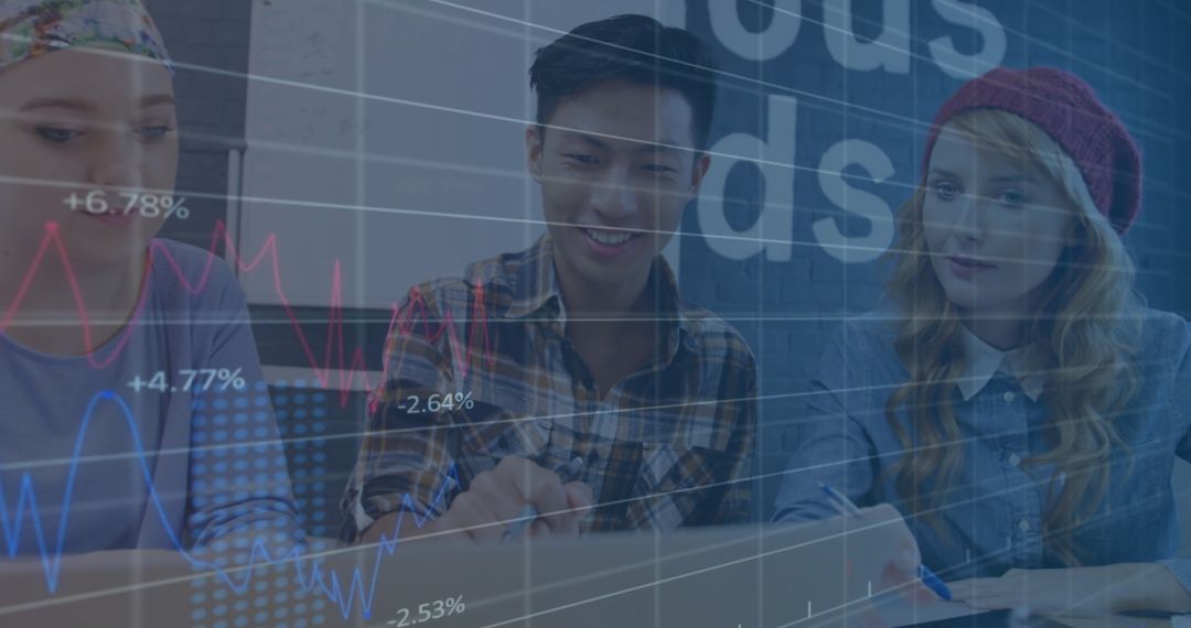 Diverse Team Analyzing Market Data on Laptops