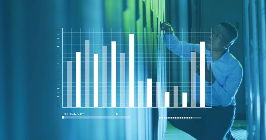Businessman Analyzing Server Data with Digital Chart Overlay in IT Environment