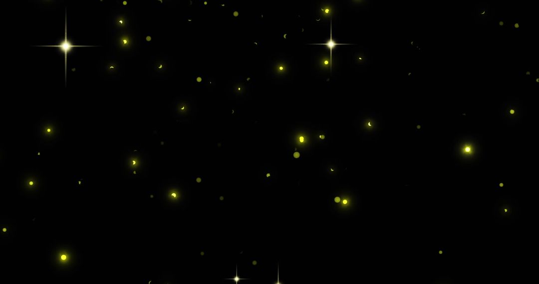 Abstract Glowing Yellow Lights on Black Background