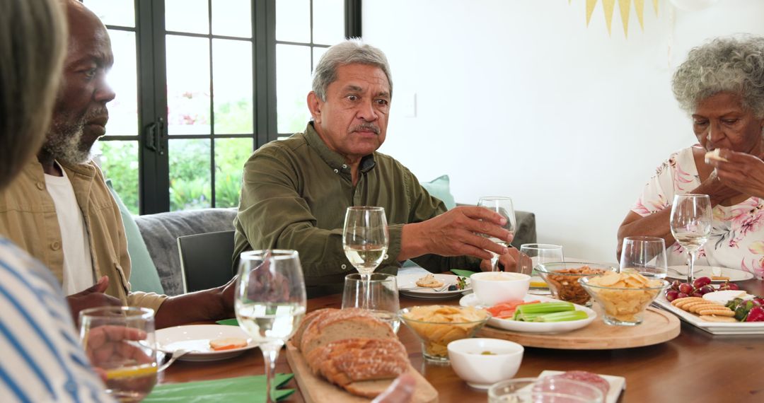 Diverse Group of Seniors Enjoying Indoor Celebration