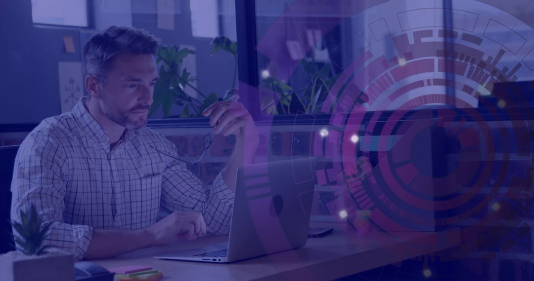 Businessman Analyzing Reports with Futuristic Digital Interface