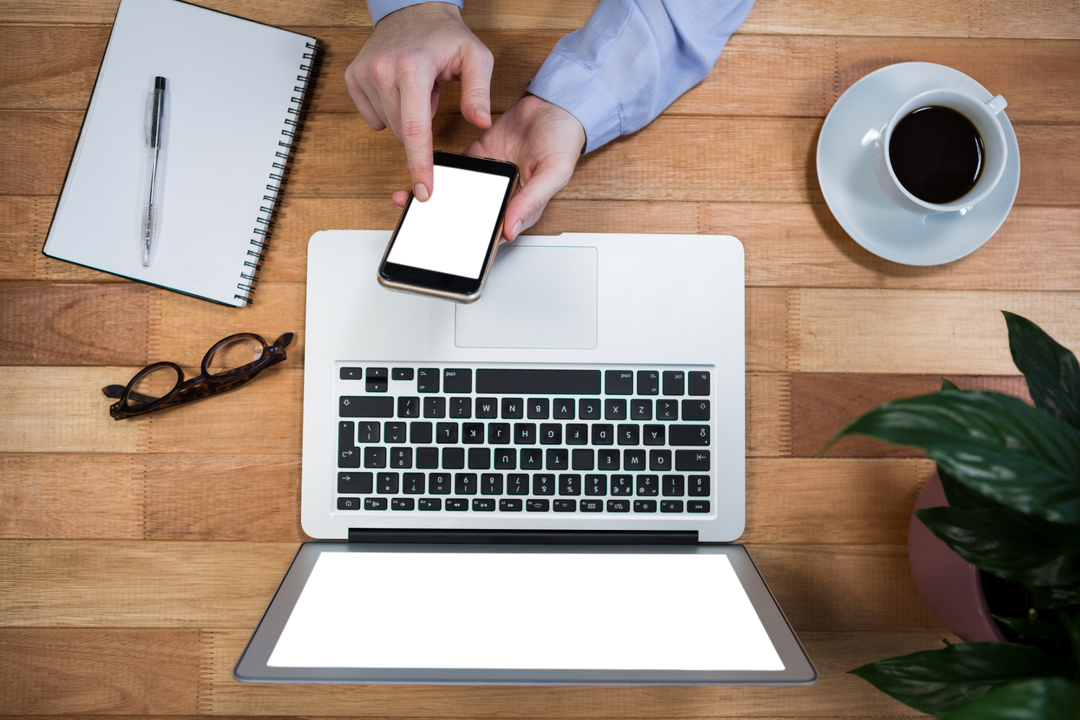 Businessperson Using Transparent Smartphone in Modern Office - Download Free Stock Images Pikwizard.com