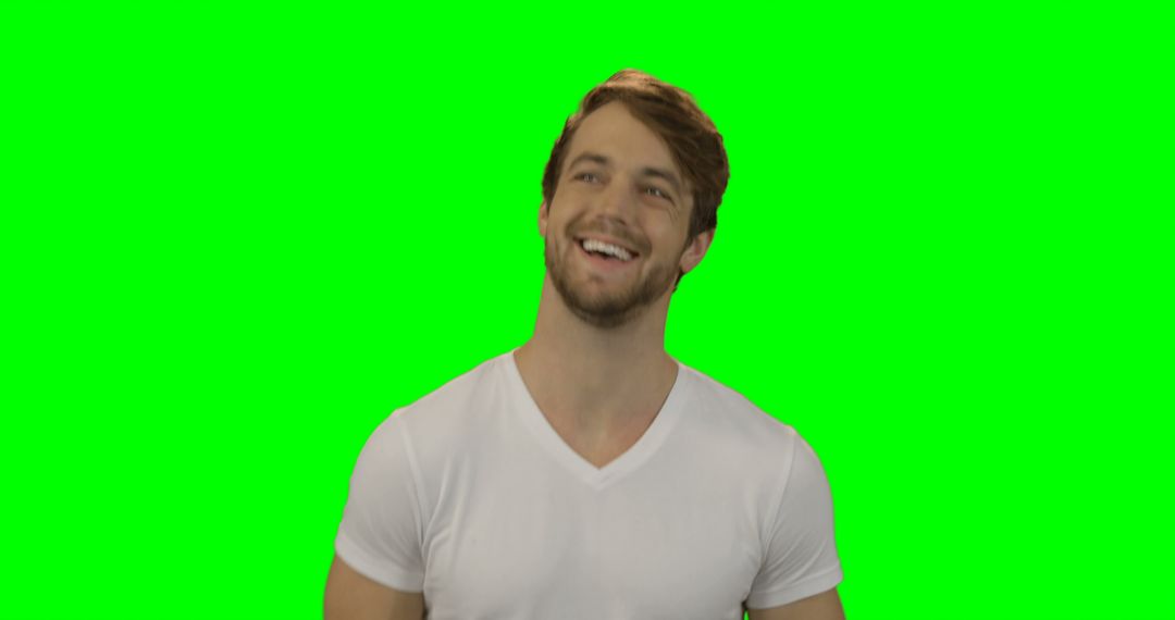 Smiling Man in White T-Shirt on Green Screen Background - Free Images, Stock Photos and Pictures on Pikwizard.com