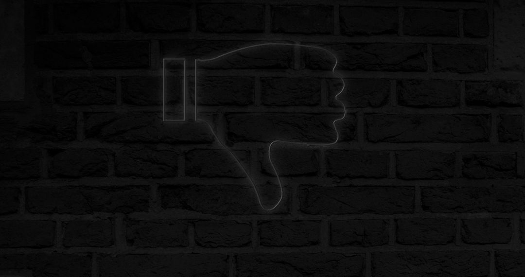 Glowing Neon Dislike Icon on Dark Brick Wall