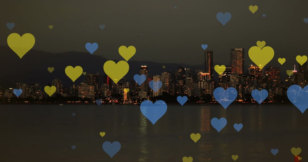 Floating Yellow and Blue Hearts Over Night Cityscape