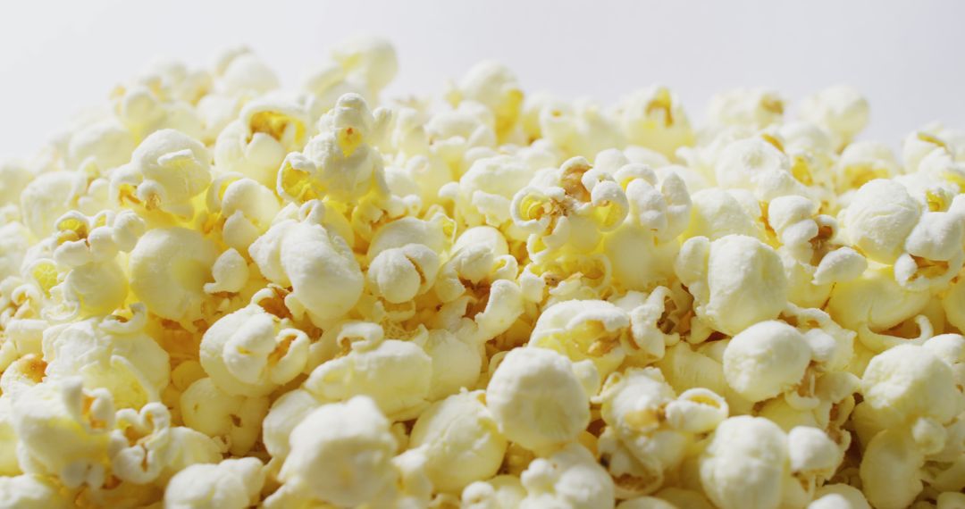 Freshly Popped Popcorn Against White Background - Free Images, Stock Photos and Pictures on Pikwizard.com