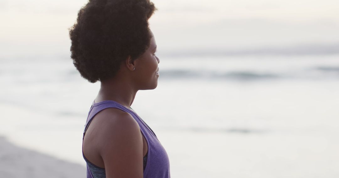 Woman Meditating by Ocean at Sunset - Free Images, Stock Photos and Pictures on Pikwizard.com