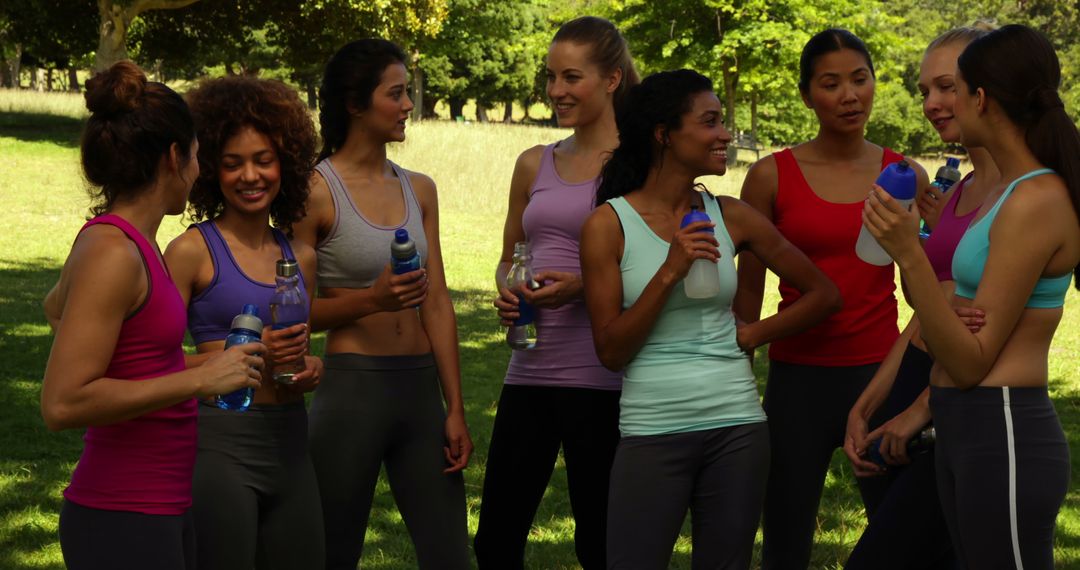 Group of Women Enjoying Refreshing Break After Outdoor Workout - Free Images, Stock Photos and Pictures on Pikwizard.com