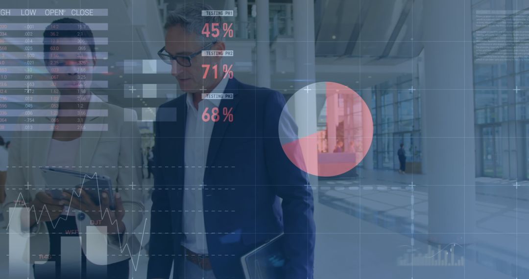 Business Professionals Analyzing Data with Digital Interface in Office