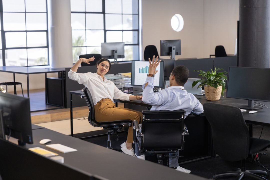 Diverse Teamwork and Collaboration in Modern Office Environment