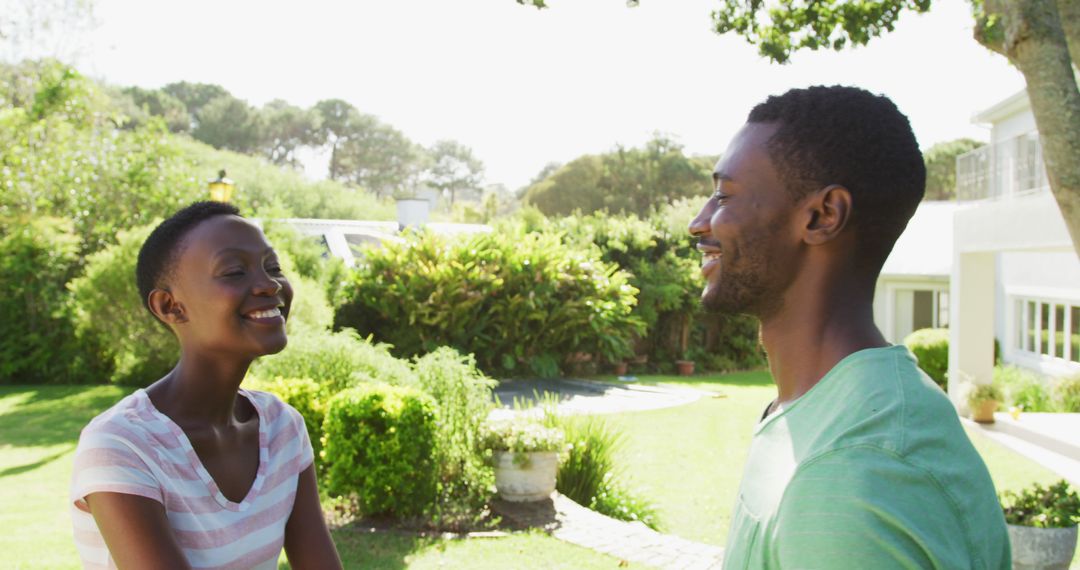 Happy Couple Hugging in Sunny Garden