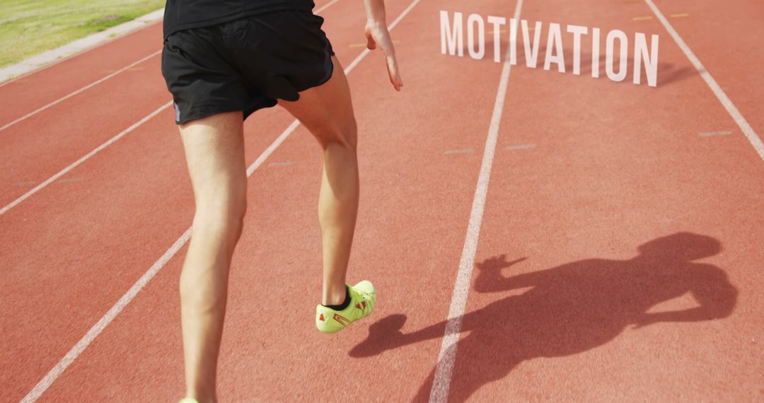 Runner on Track Showing Motivation and Determination - Free Images, Stock Photos and Pictures on Pikwizard.com