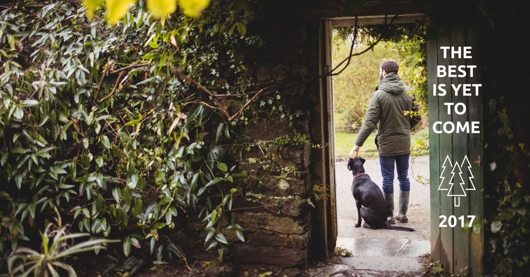 Person and dog embrace new journey in garden setting