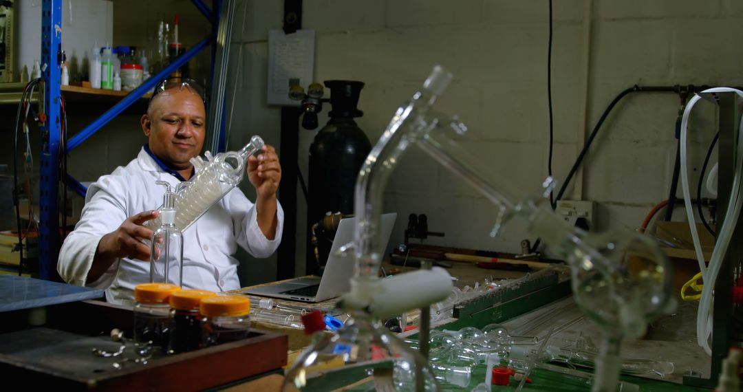 Scientist Working in Laboratory Handling Glass Apparatus - Free Images, Stock Photos and Pictures on Pikwizard.com