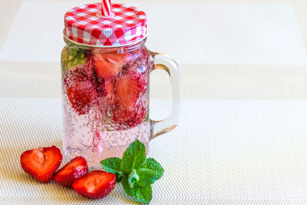Refreshing Strawberry Drink with Mint in Mason Jar - Free Images, Stock Photos and Pictures on Pikwizard.com