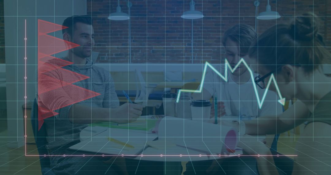 Colleagues Collaborating Over Data Analysis in Modern Office