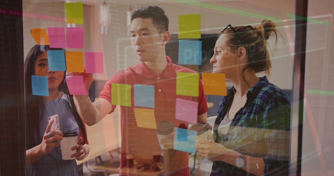 Diverse Team Collaborates Over Coffee and Colorful Sticky Notes